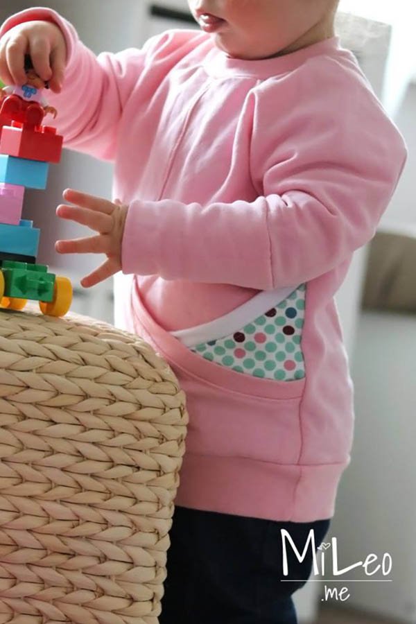 Pinio Pulli aus rosa Sweat mit gepunkteter Eingrifftasche